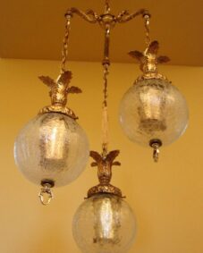 1960s Hollywood-Regency tri-globe chandelier. Extraordinary.