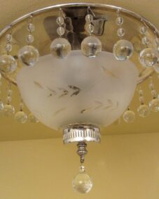 Exquisite circa-1940 crystal fixture. Ideal for foyer or powder room.